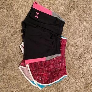 2 girls size large nike under armour shorts